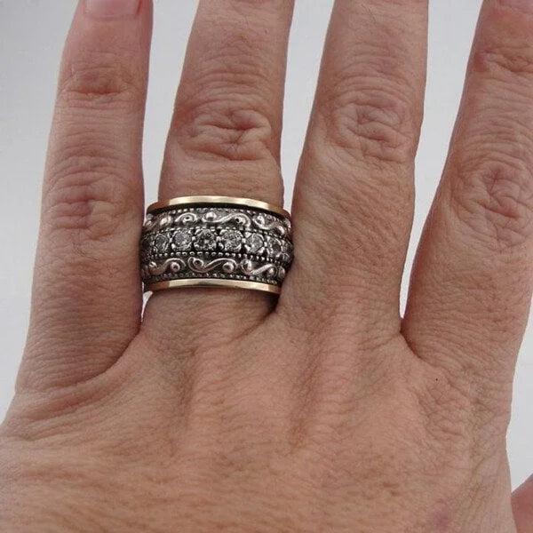 Ring with carved gemstone