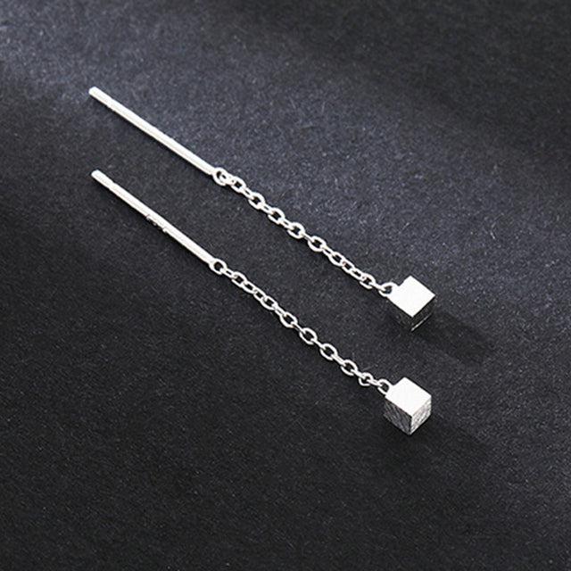 Cubic dangling earrings